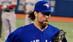 blue jays beat white sox, r.a. dickey leaves early due to soreness